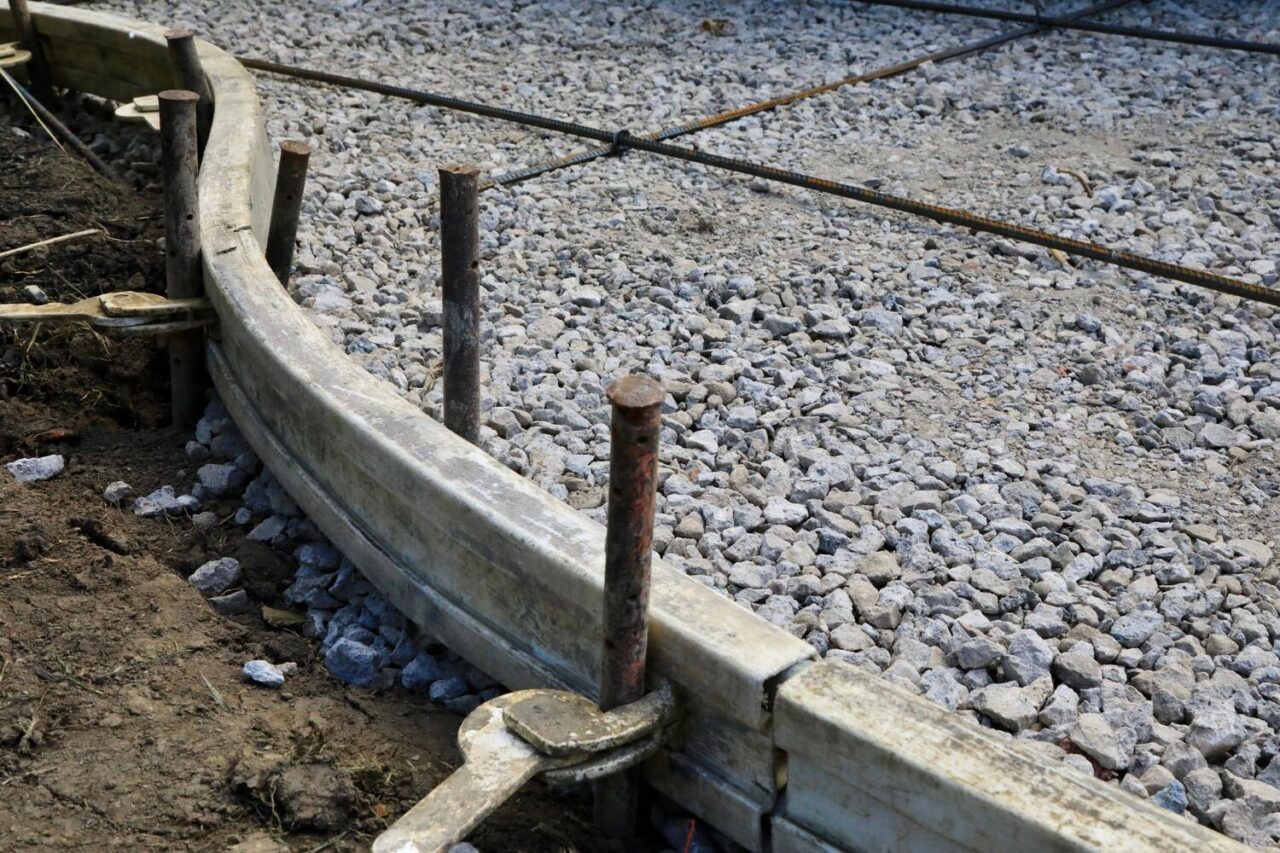 curved concrete driveway with rebar