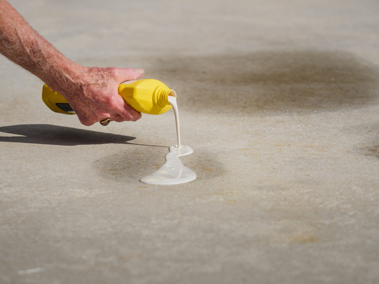spot cleaning stains on concrete driveway
